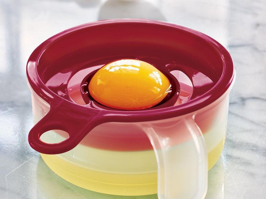 egg yolk in red egg separator for the tupperware all in one mate red